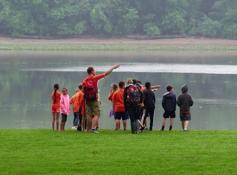 students at the river